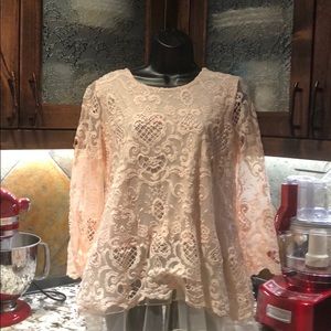 Pink blouse with lace